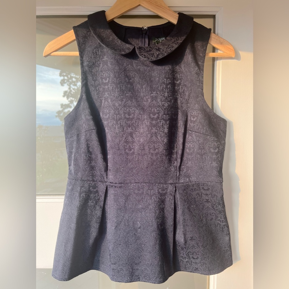 J. Crew navy peplum blouse.